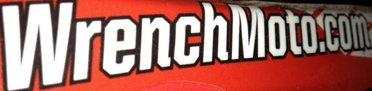 Original red and white WrenchMoto.com logo from the 2023–2024 blog